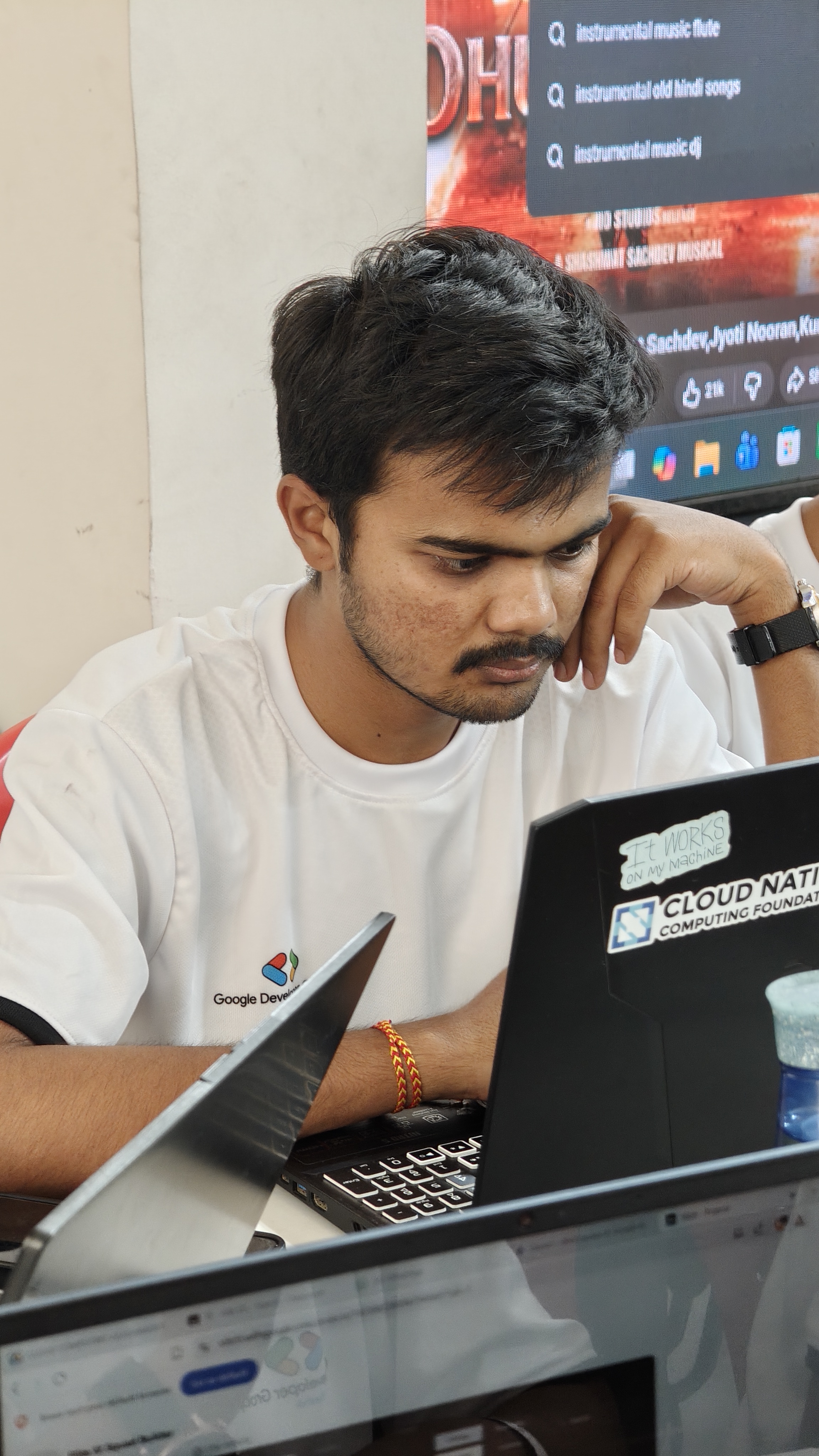 Vishal Raut working on his laptop